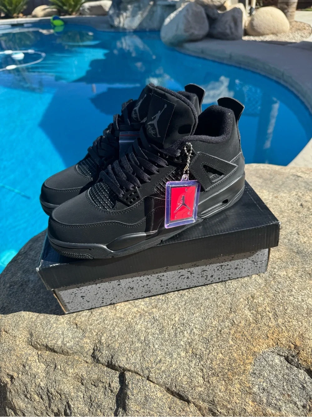 Jordan Men's Black Retro Sneakers with Subtle Red Accent